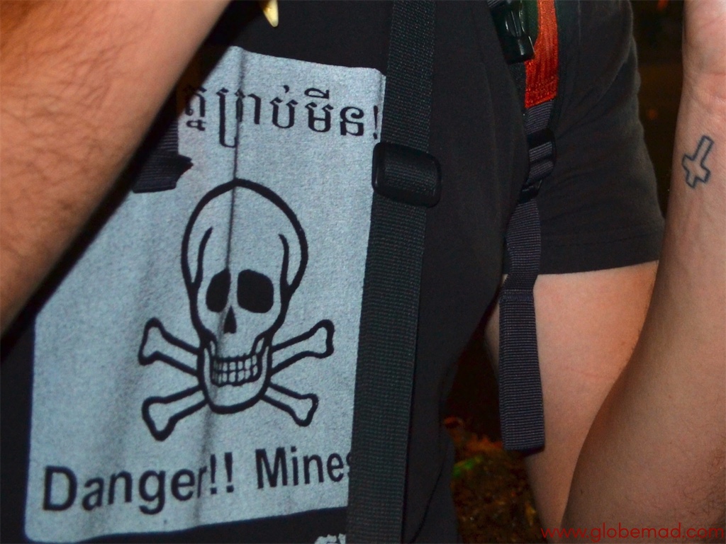 Travel inspiration photos for backpacking in Cambbodia Globemad blogger photographs  land mines tshirt