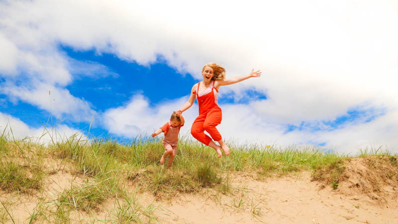 uk staycations in England sand dune jumping